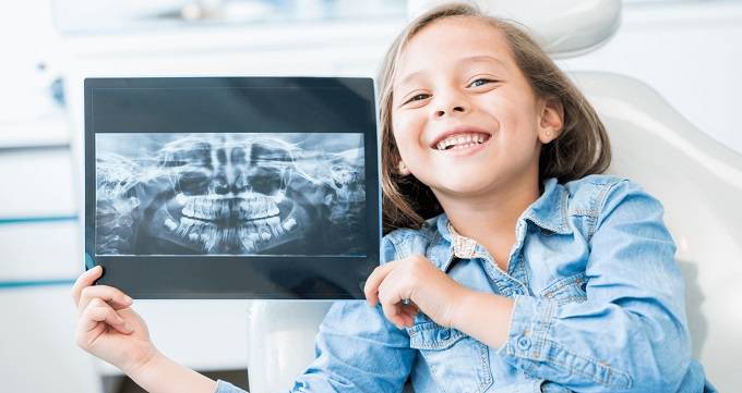 چه عواملی در رادیوگرافی دندان تأثیر می‌گذارند؟